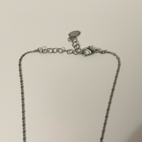 Amber Lee Silver Tone Cross Pendant Necklace - Picture 11 of 14